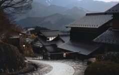 Stone path through traditional houses in a Japanese mountain village