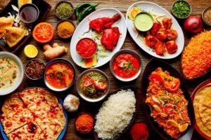 Traditional Indian food plate with popular Indian dishes and spices