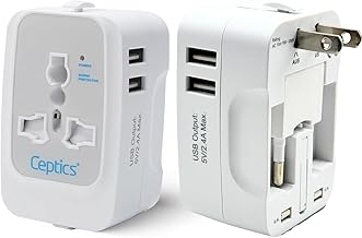 Universal travel power adapter with multiple USB ports and interchangeable plugs.